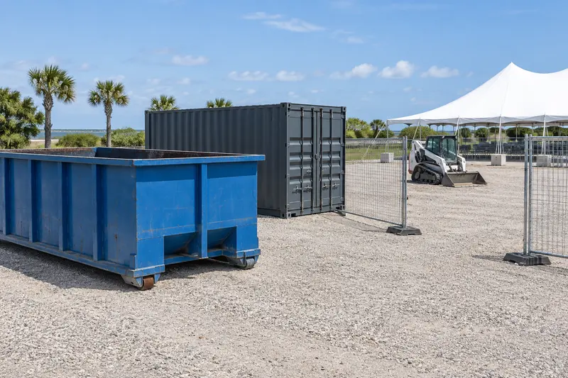Dumpster, storage container and temporary event equipment in an outdoor setup