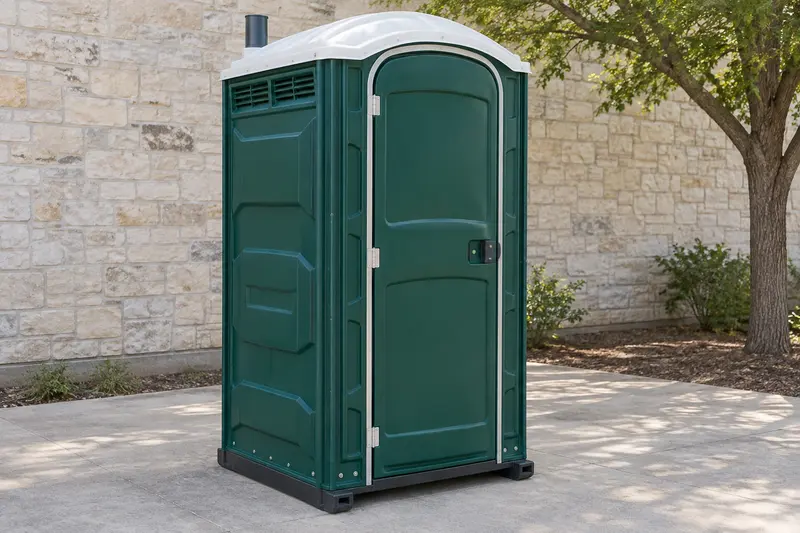 Standard portable toilet with its full doorway and base visible